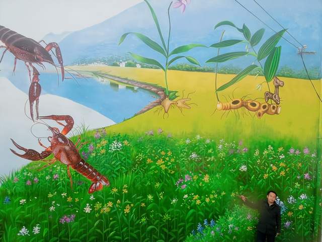 武穴市梅川镇：“木工”卢野墙绘作品惊艳大江南北